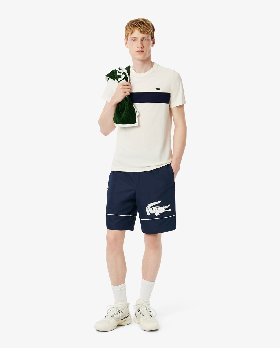 Lacoste - Pantalón de hombre corto de tenis de tafetán diamantado estampado en negro.
