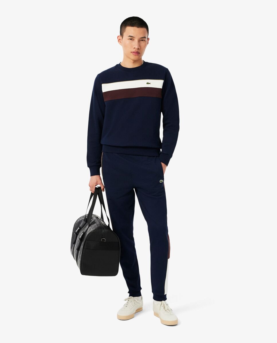 Lacoste - Pantalones joggers de hombre de felpa de corte tapered.