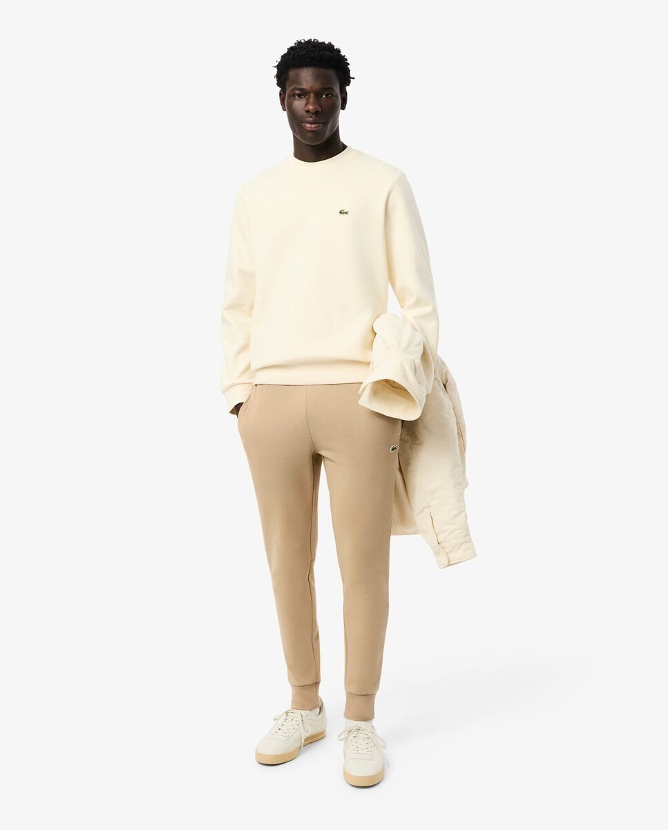 Lacoste - Pantalón jogger de hombre en felpa de algodón ecológico.