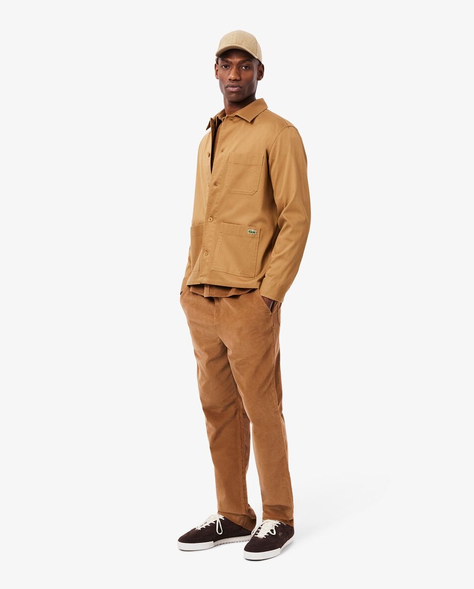 Lacoste - Pantalones Chinos de hombre de corte recto.