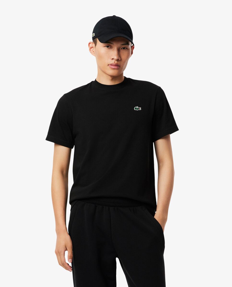 Lacoste - Camiseta de hombre deportiva lisa ultra-dry de manga corta.