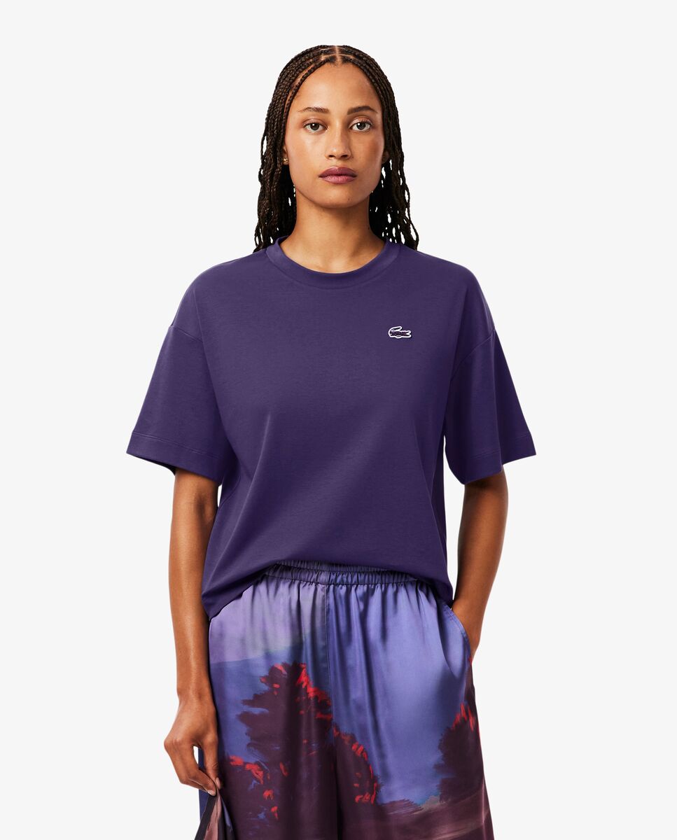 Lacoste - Camiseta de mujer de corte holgado con cocodrilo con paisaje en rosa de manga corta.