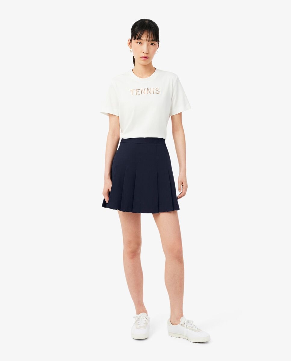 Lacoste - Falda corta plisada de algodón elástico.