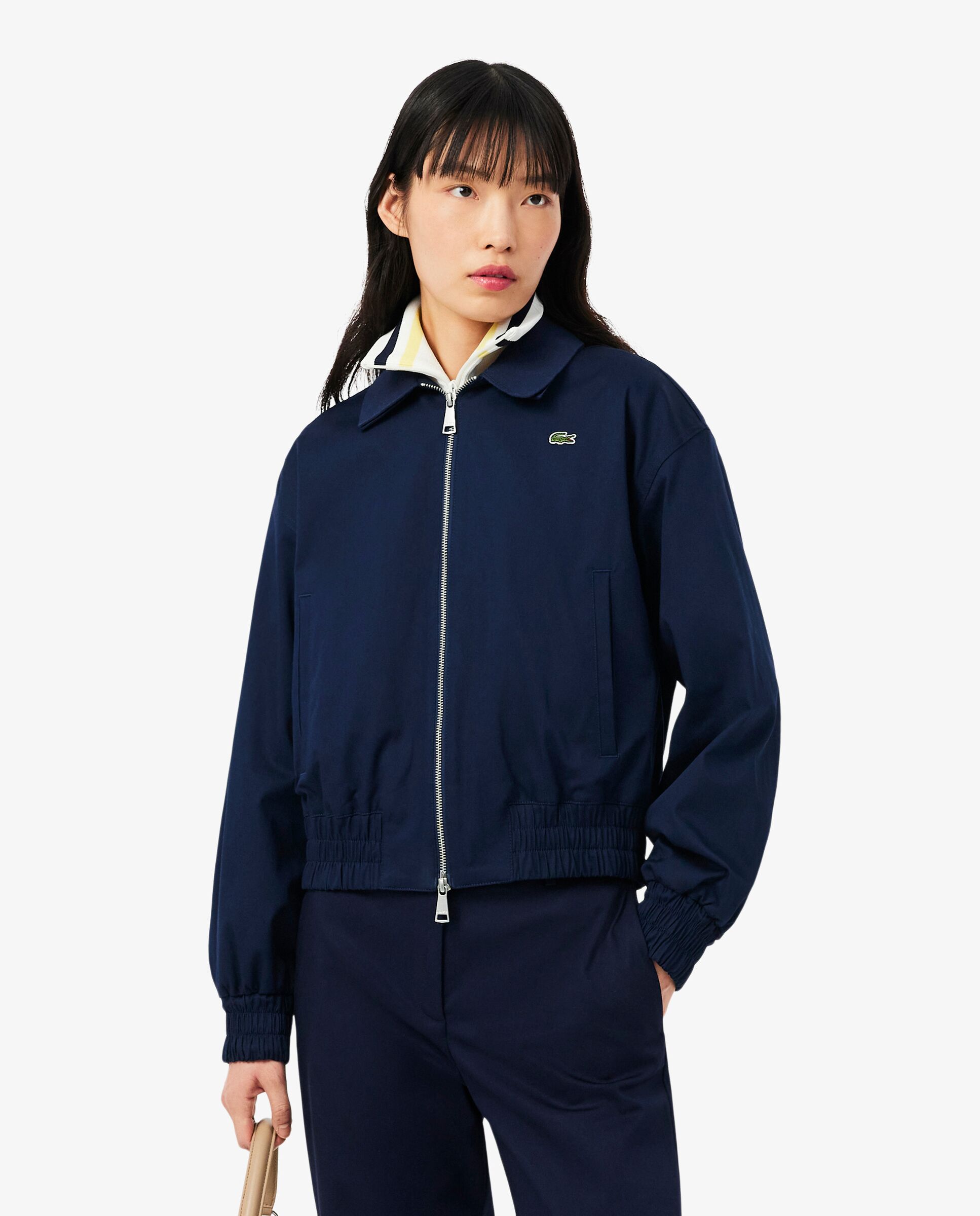 Lacoste - Chaqueta de mujer elástica con cuello doble.