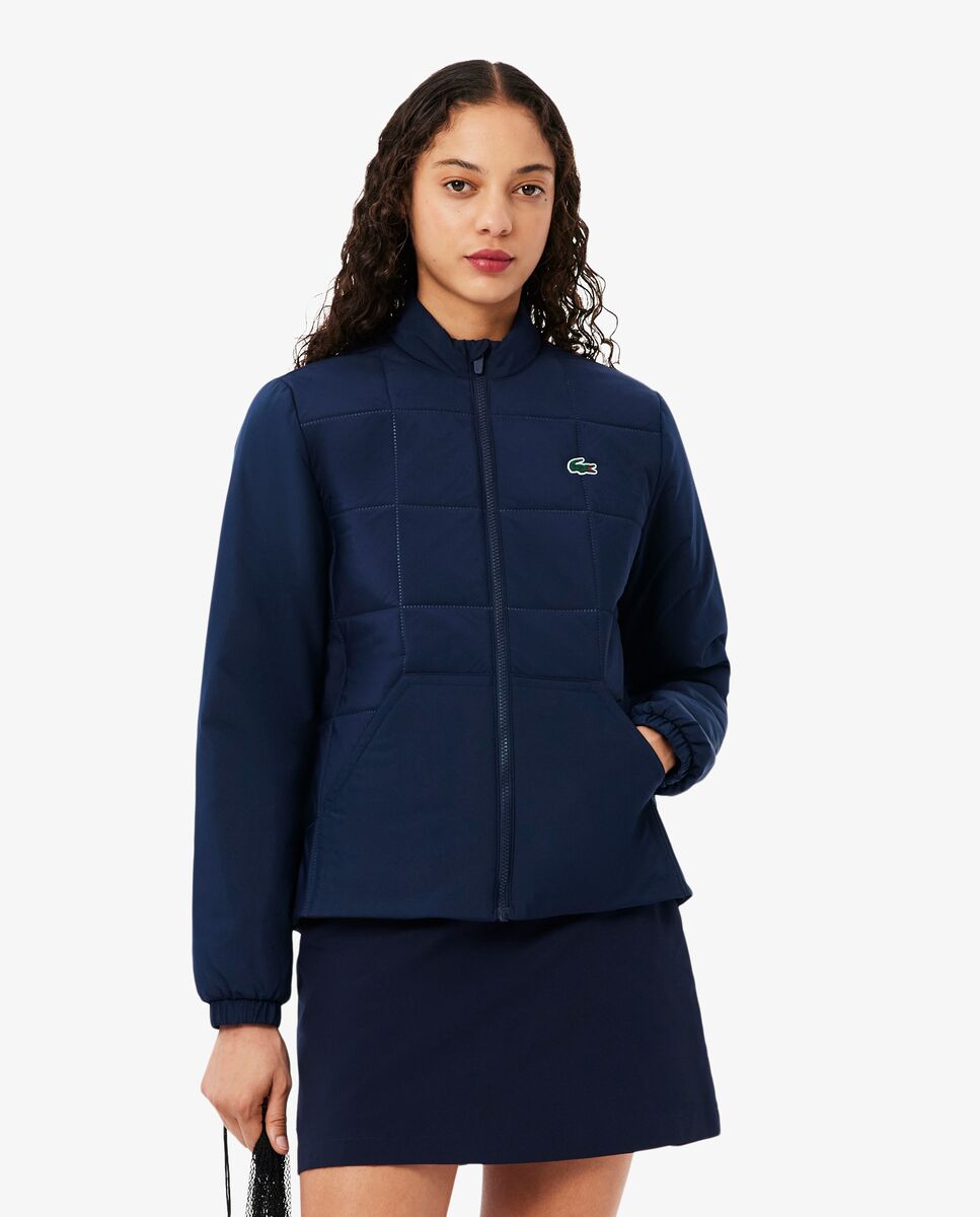 Lacoste Chaqueta de mujer de golf hidrófuga con protección uv en azul Azul marino