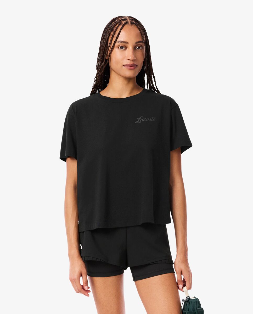 Lacoste - Camiseta de mujer deportiva de punto técnico ultra-dry en negro de manga corta.