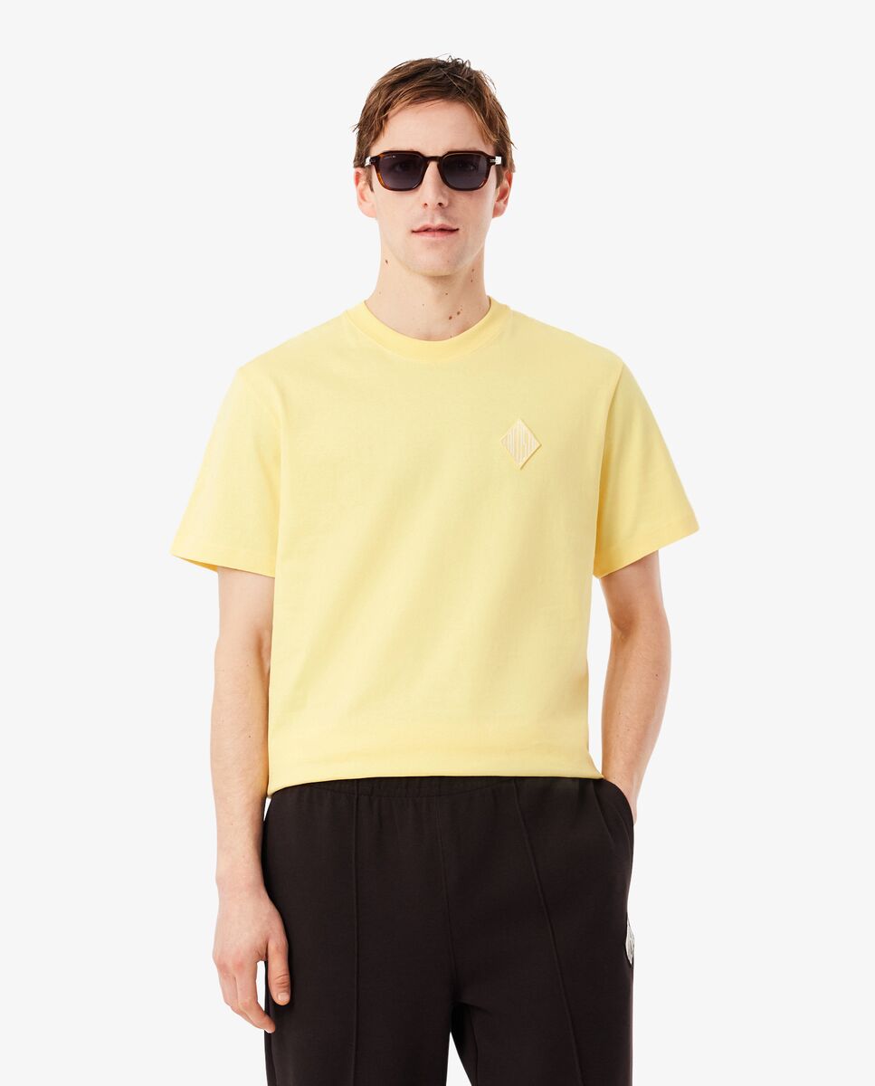 Lacoste - Camiseta de hombre gruesa de corte clásico e insignia en contraste en amarillo de manga corta en amarillo.