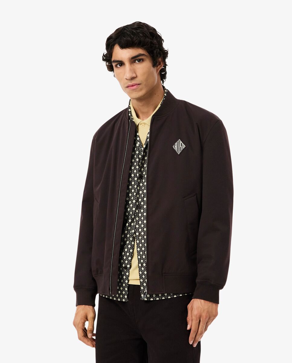 Imagen 0 de Cazadora de hombre tipo bomber hidrófuga con insignia retro Marrón