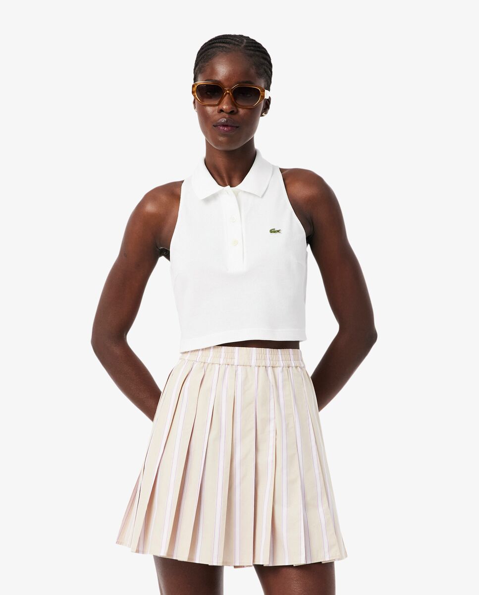 Lacoste - Polo de mujer sin mangas de piqué en rosa.