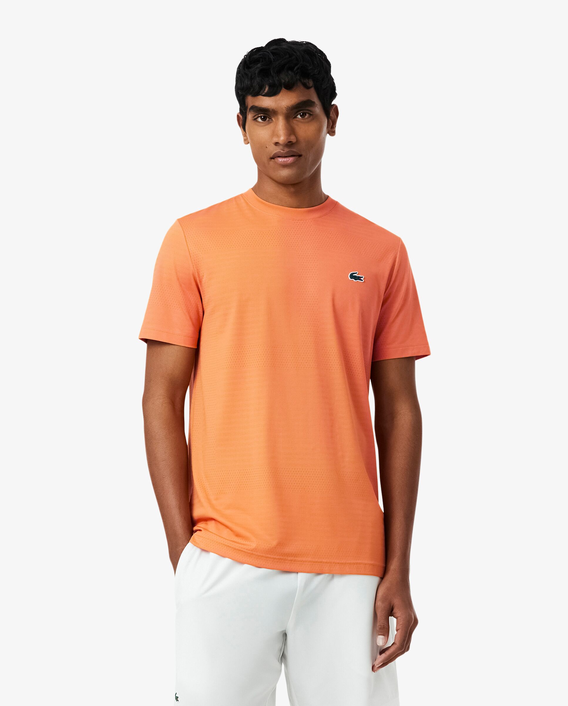Lacoste - Camiseta de hombre de tenis de jacquard elástico ultra-dry de manga corta.