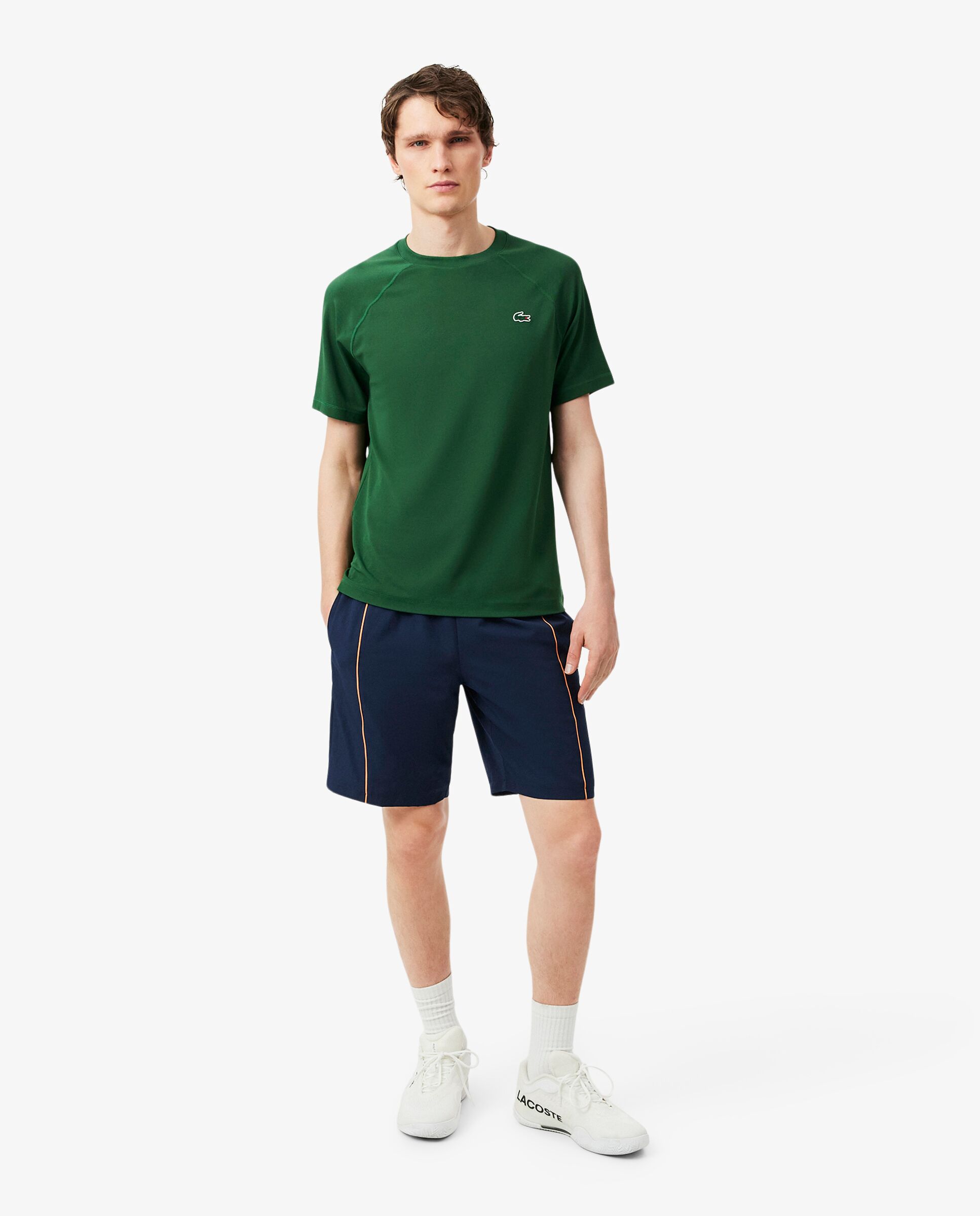 Lacoste - Pantalones cortos de hombre deportivos de tafetán diamantado con ribete en contraste en azul.