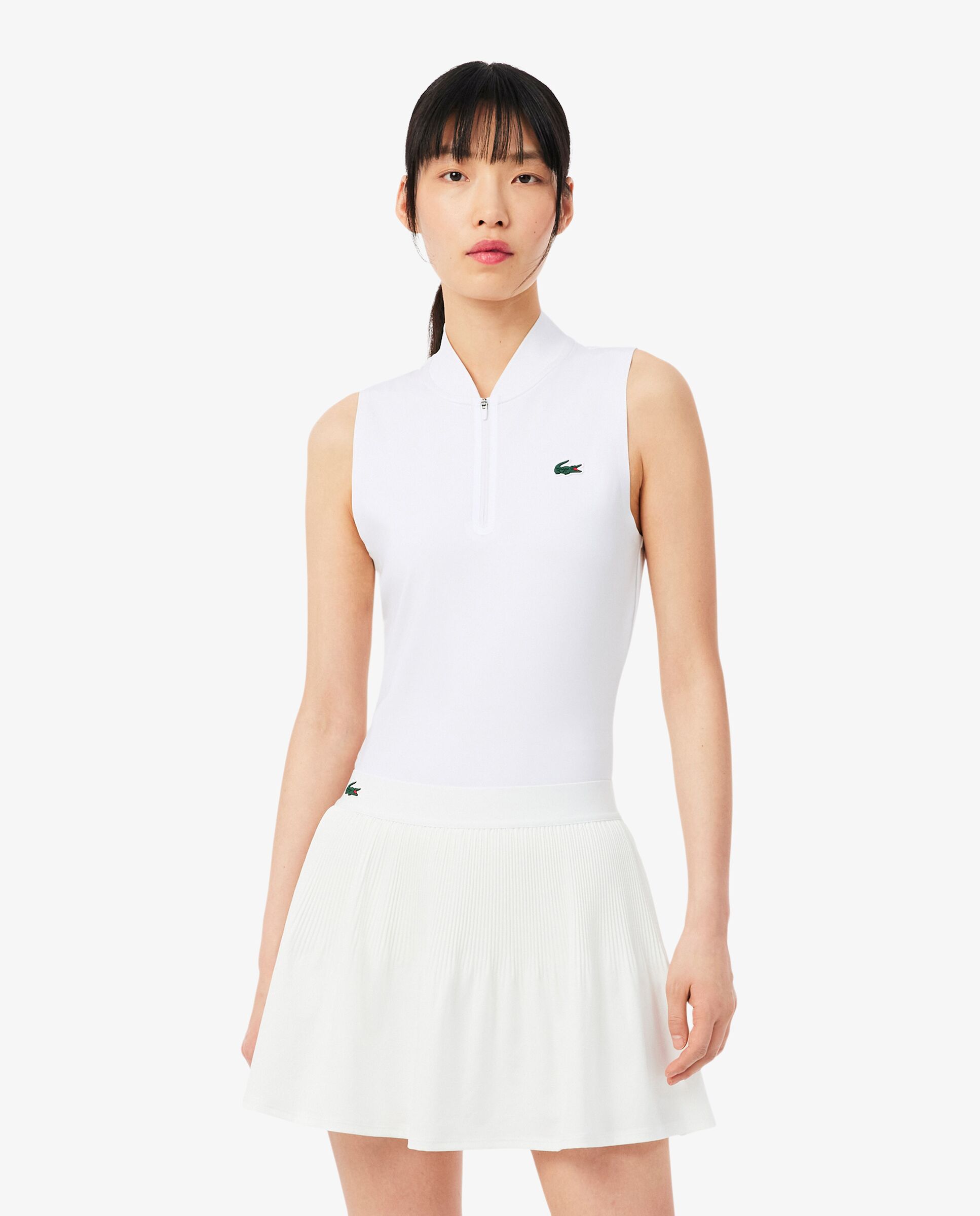 Lacoste - Polo de mujer de tenis elástico sin mangas Ultra-Dry en azul.