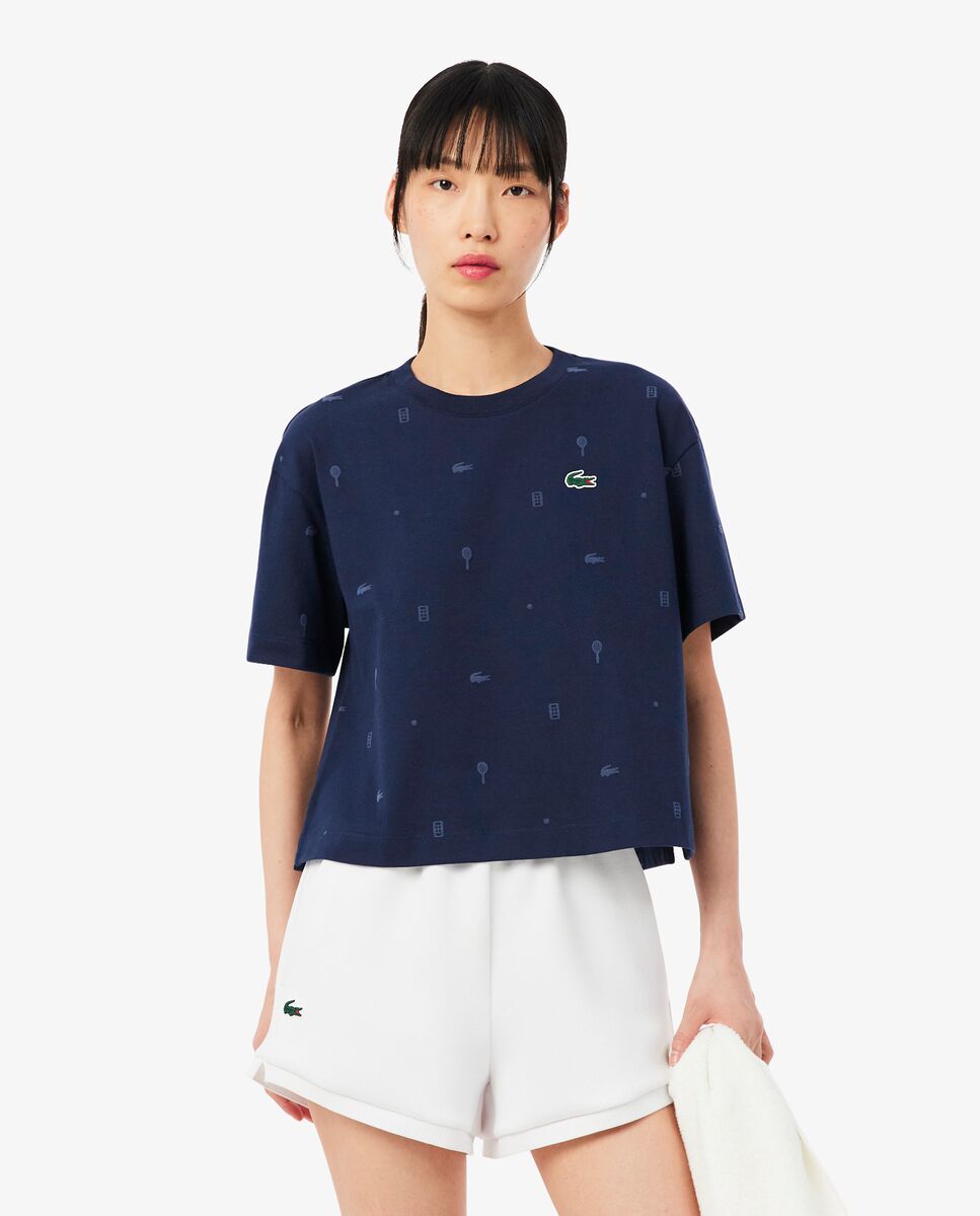 Lacoste - Camiseta de mujer de tenis oversized Ultra Dry en blanco de manga corta.