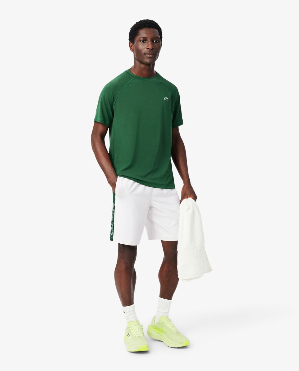 Imagen 0 de Pantalón de hombre corto deportivo con franja en contraste Blanco