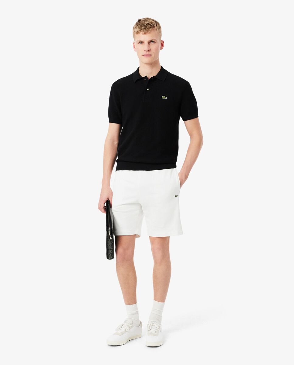 Lacoste - Pantalón de hombre corto de felpa de corte regular con raya de logotipo.