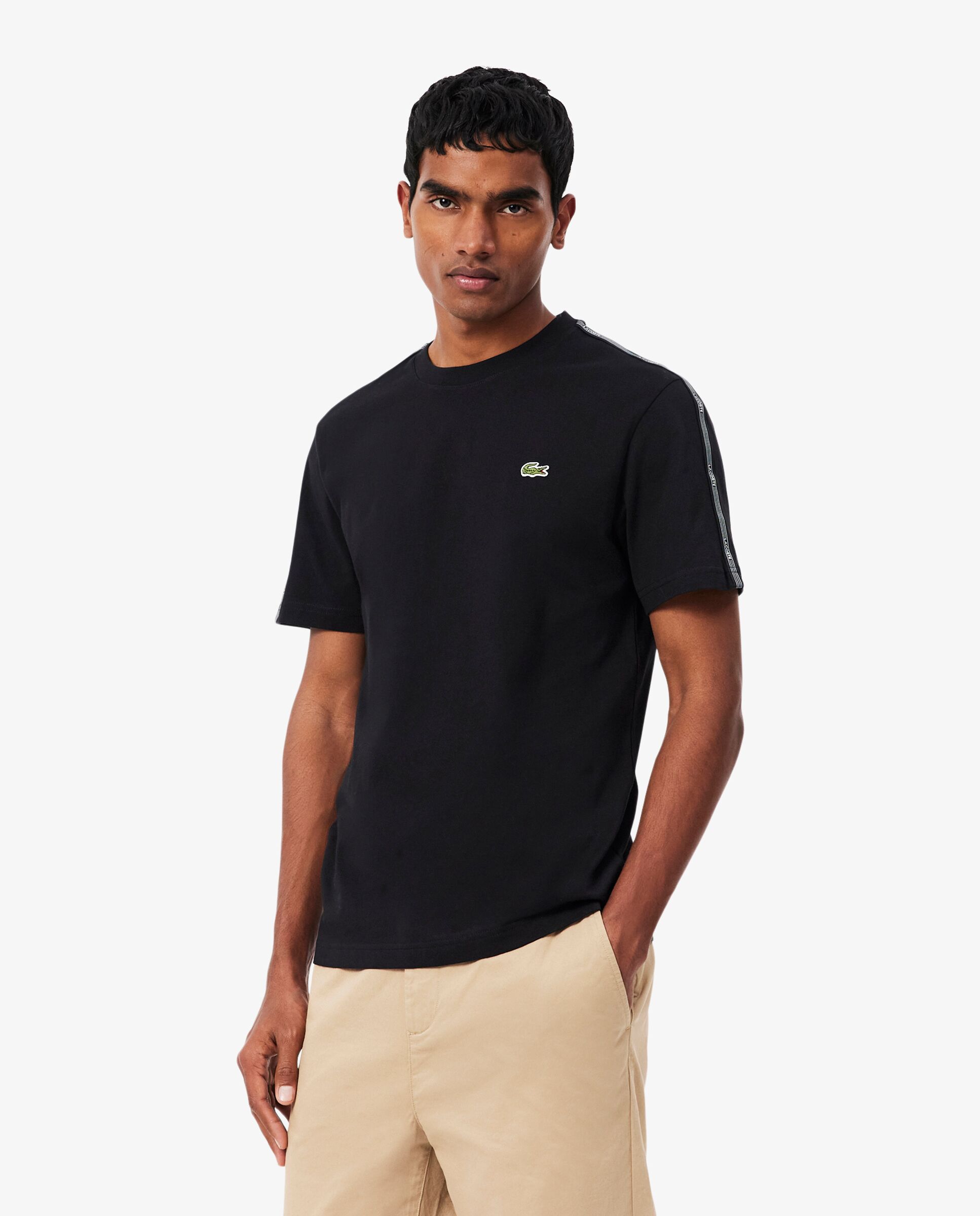 Lacoste - Camiseta de hombre con franja de rayas de la marca en negro de manga corta en negro.