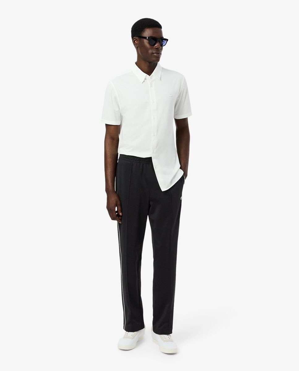 Lacoste - Pantalón de hombre de piqué con ribete.