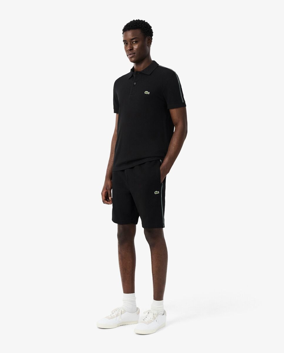 Imagen 0 de Pantalones cortos de hombre de felpa de corte regular con raya de logotipo Negro