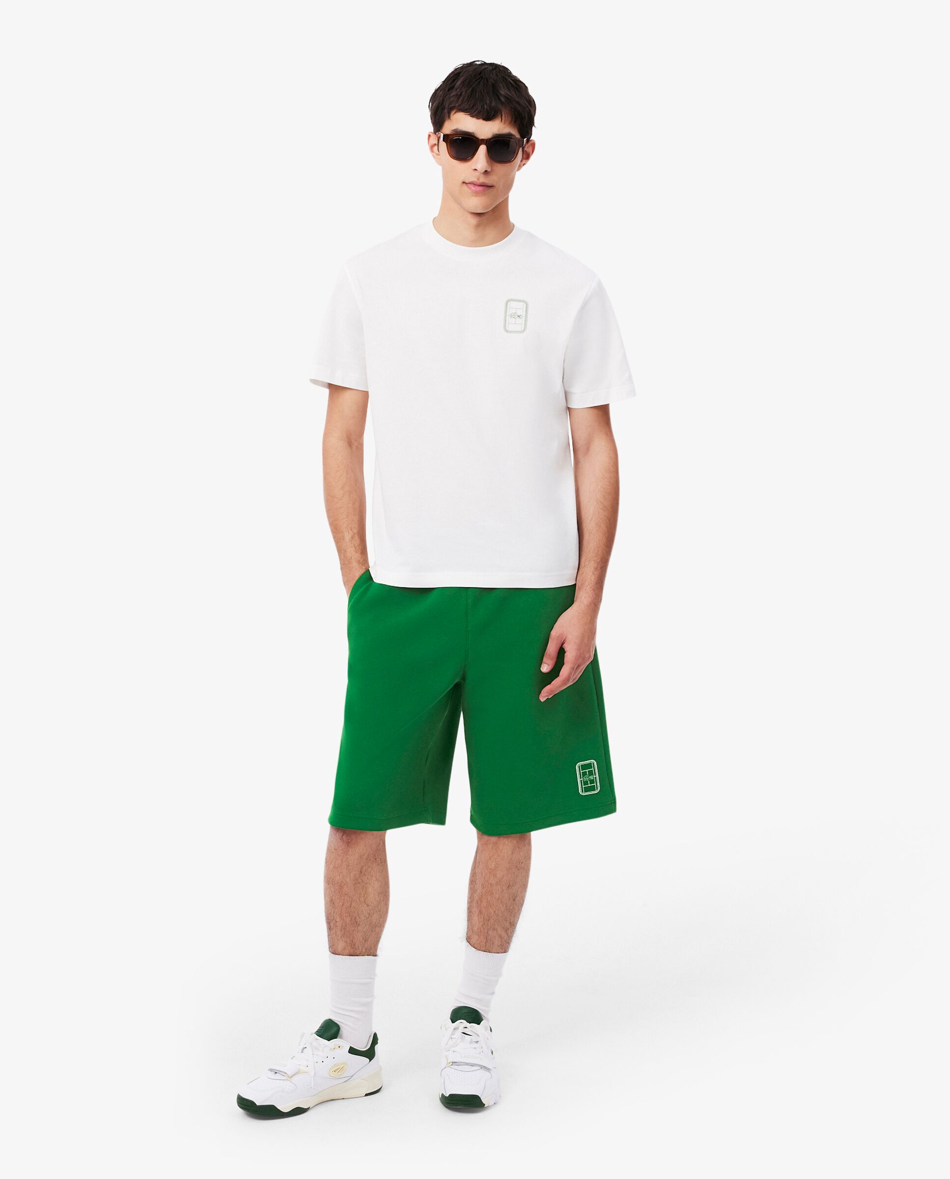 Lacoste - Pantalones cortos de hombre de piqué de doble cara de corte holgado en verde.