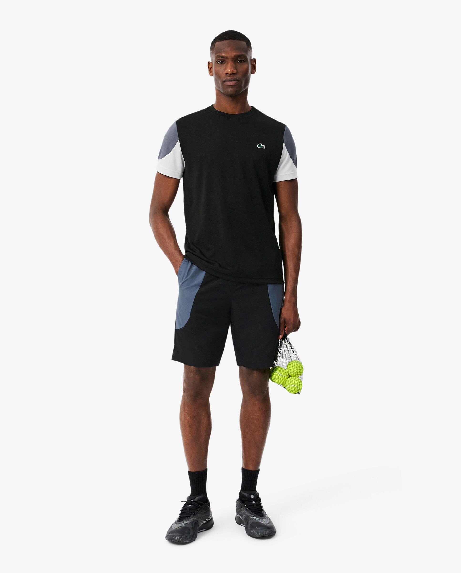 Imagen 0 de Pantalones cortos de hombre deportivo hidrófugo con bloques de color en blanco Negro