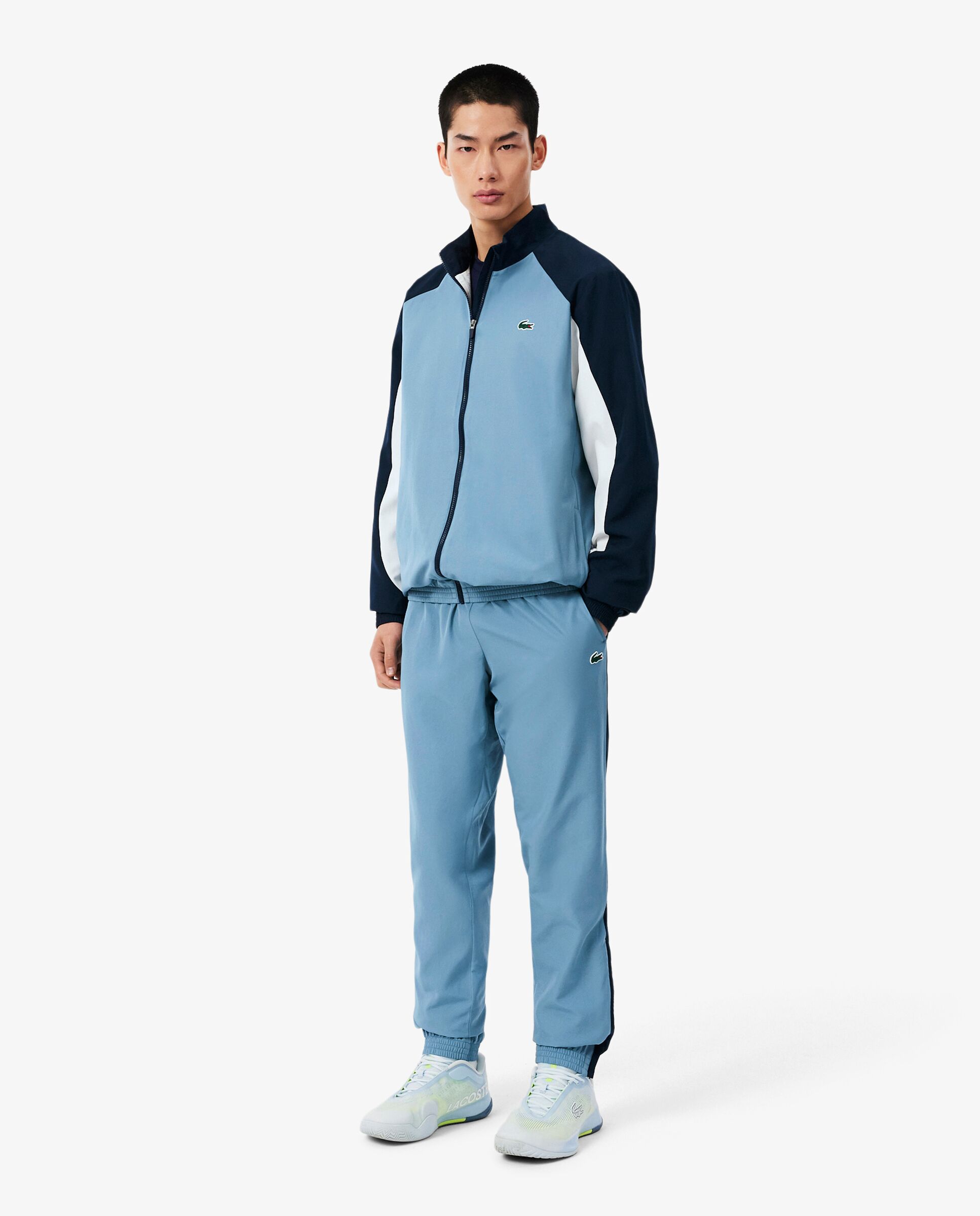 Imagen 0 de Chándal de hombre deportivo con bloques de color estampados en azul Azul / Negro