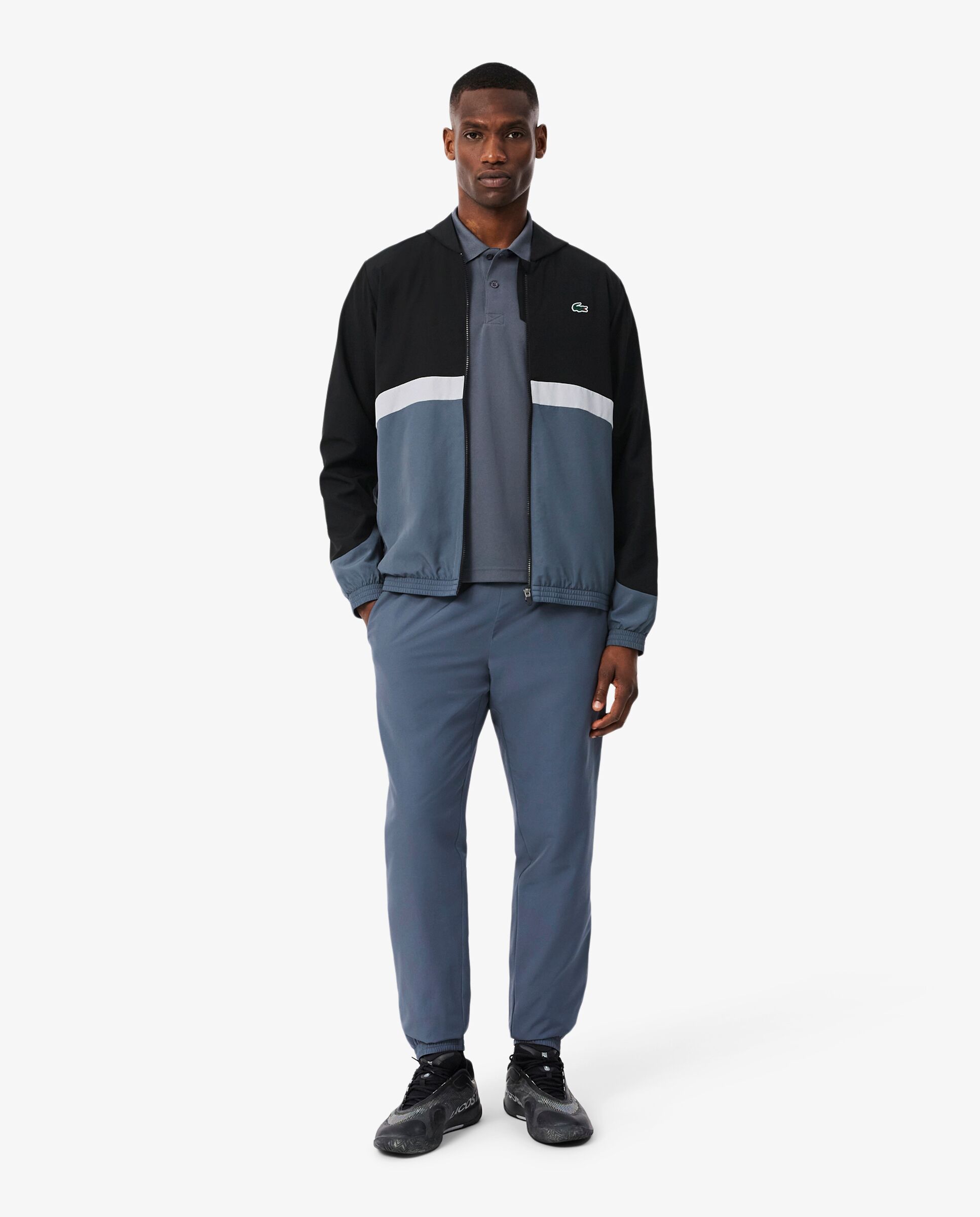 Imagen 0 de Chándal de hombre deportivo con bloques de color estampados en bleu marine / blanc / bleu Negro