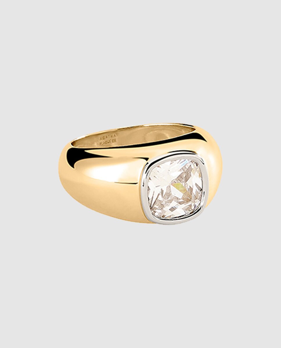 Anillo ancho acabado en oro con circonita en forma de cojín. 50 aniversario