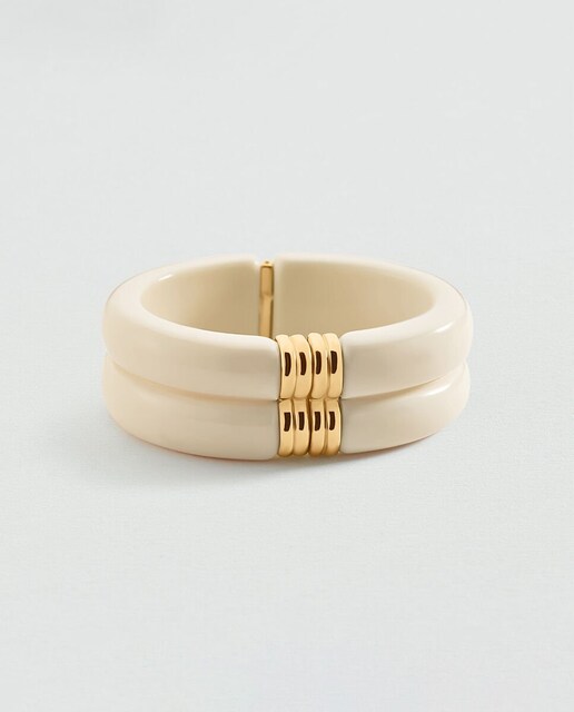 Imagen 0 de Pulsera rígida y articulada de resina blanca y acabada en oro