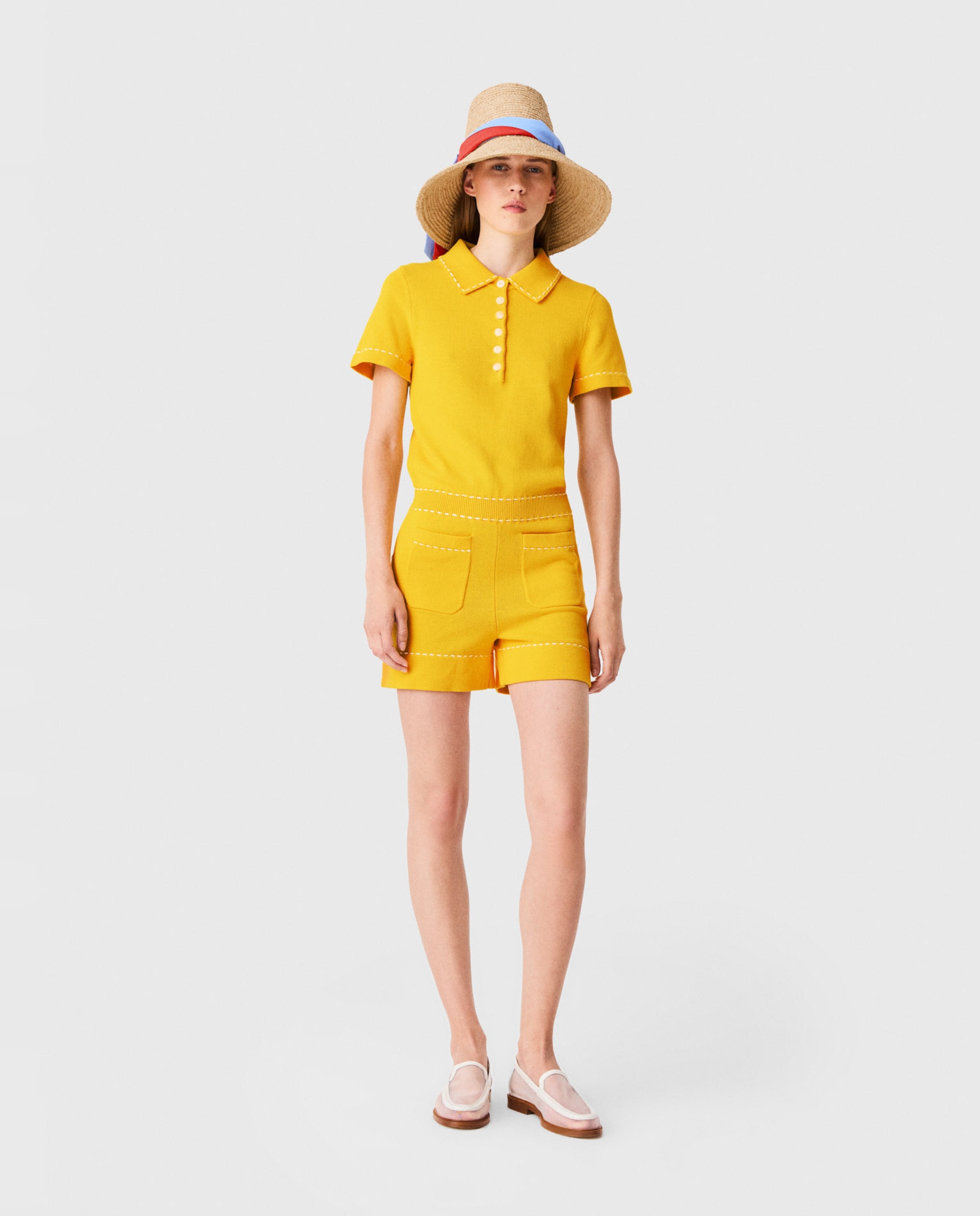 Maje - Mono de mujer corto 100% algodón con cuello polo.