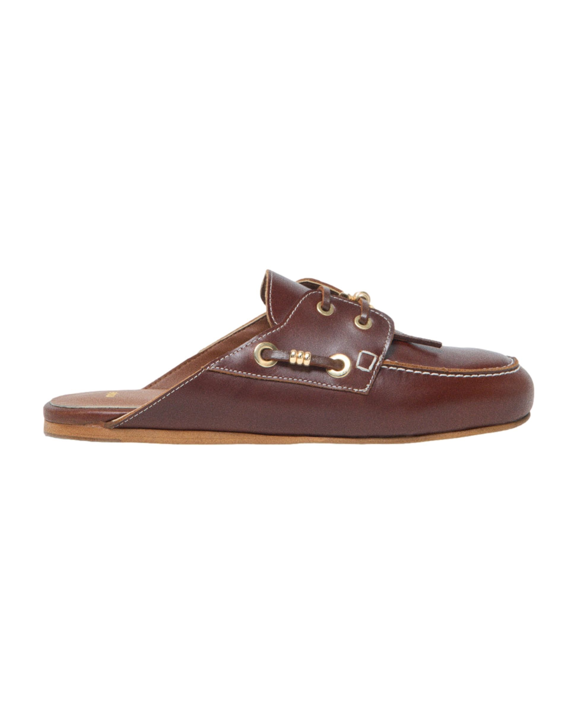 Maje - Mules planos de mujer de piel con cordones.