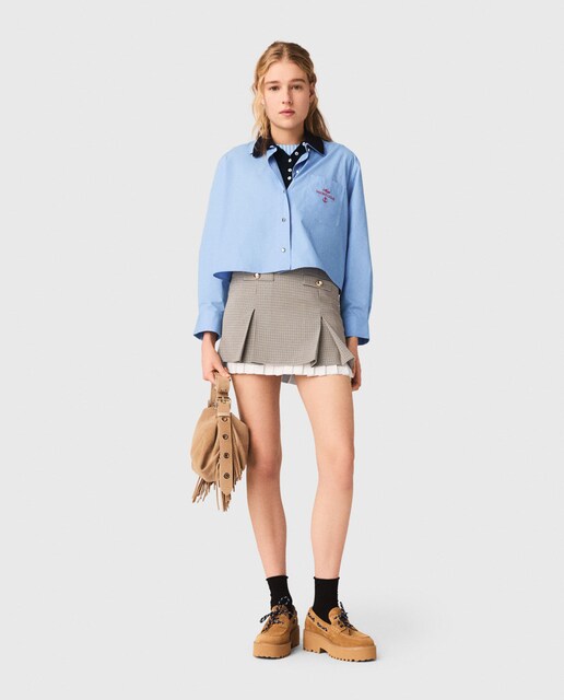 Imagen 0 de Minifalda plisada de pata de gallo con detalle de popelina