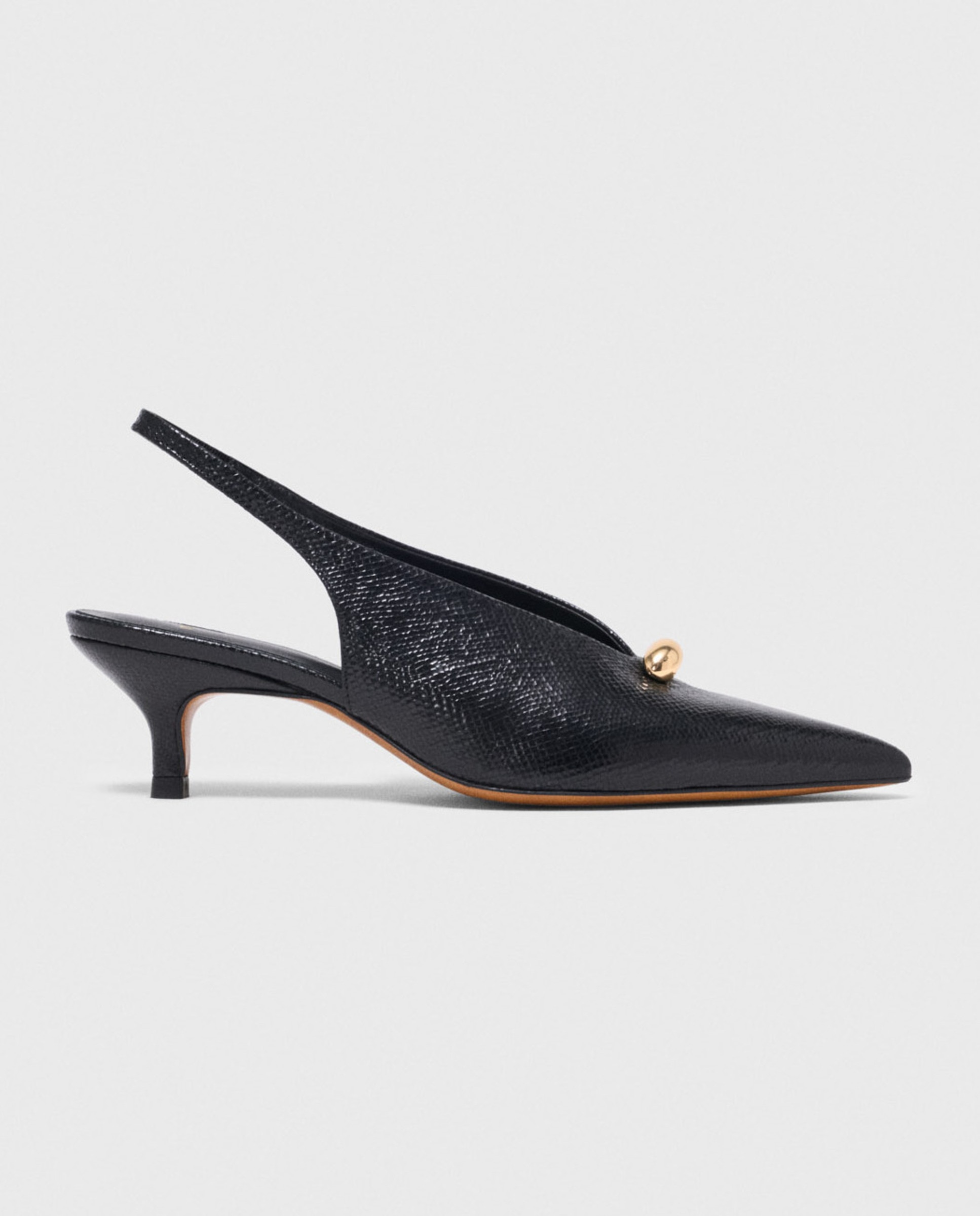 Imagen 1 de Zapatos de salón de mujer destalonados de piel efecto víbora Negro