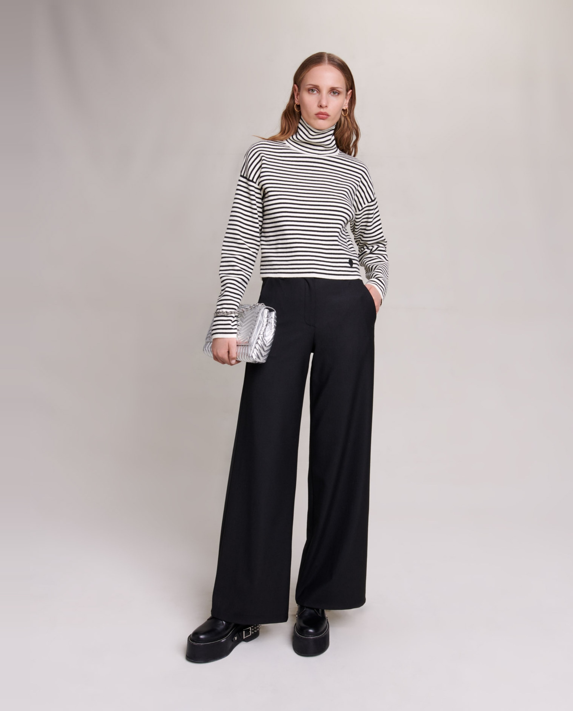 Maje - Pantalón de campana de mujer liso con bolsillos.