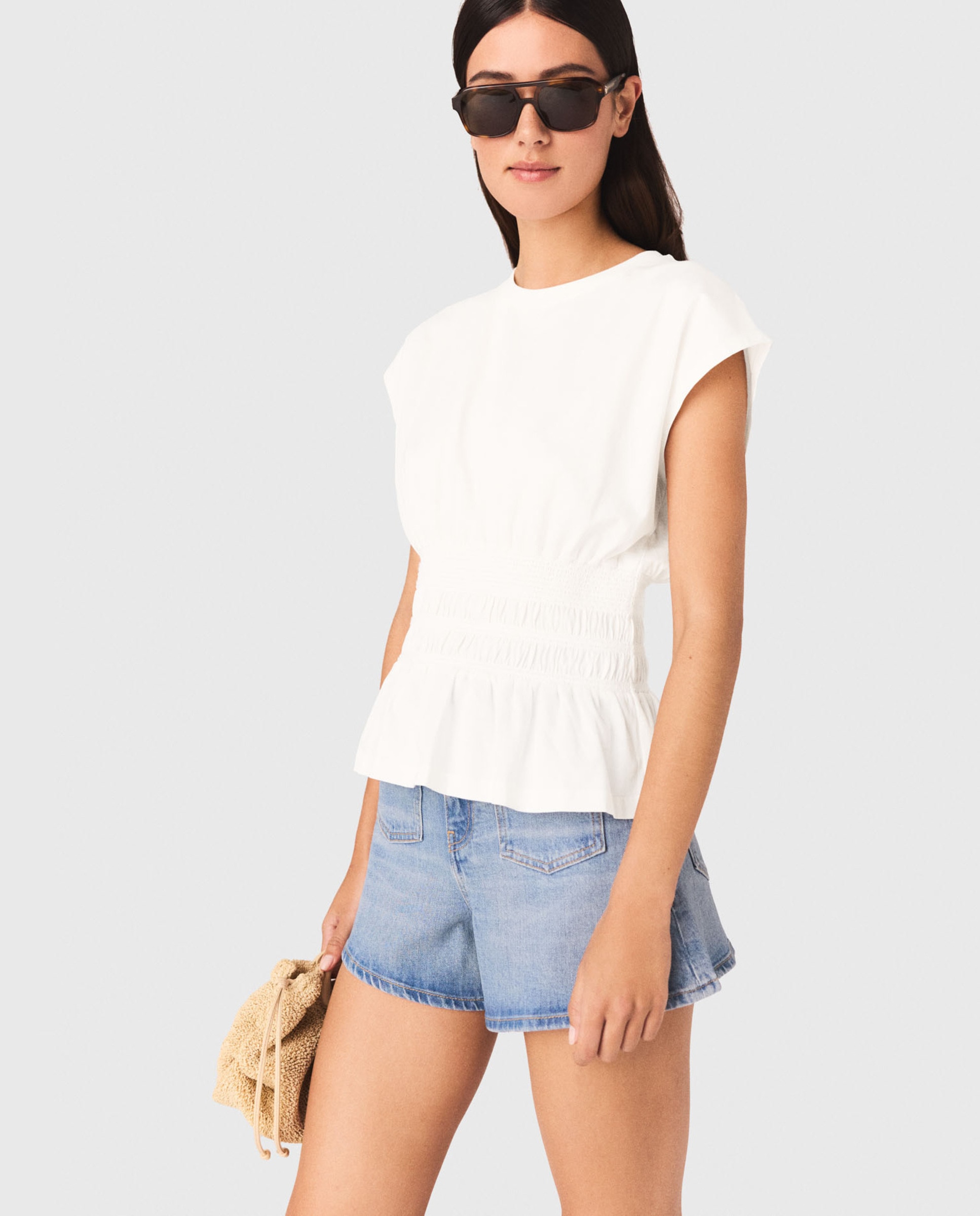 Maje - Camiseta de mujer ceñida plisada.