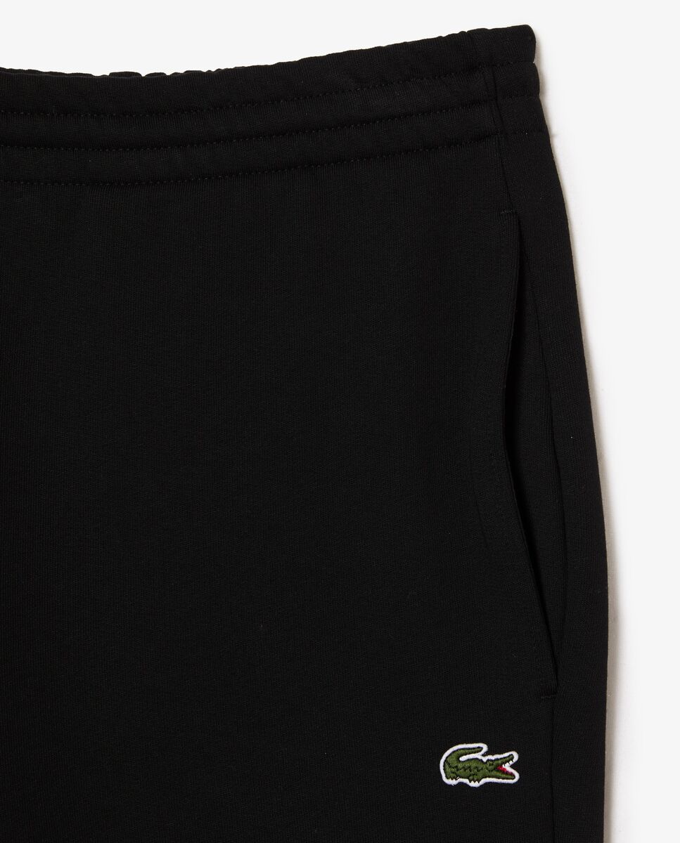Lacoste - Pantalón jogger de hombre en felpa de algodón ecológico.