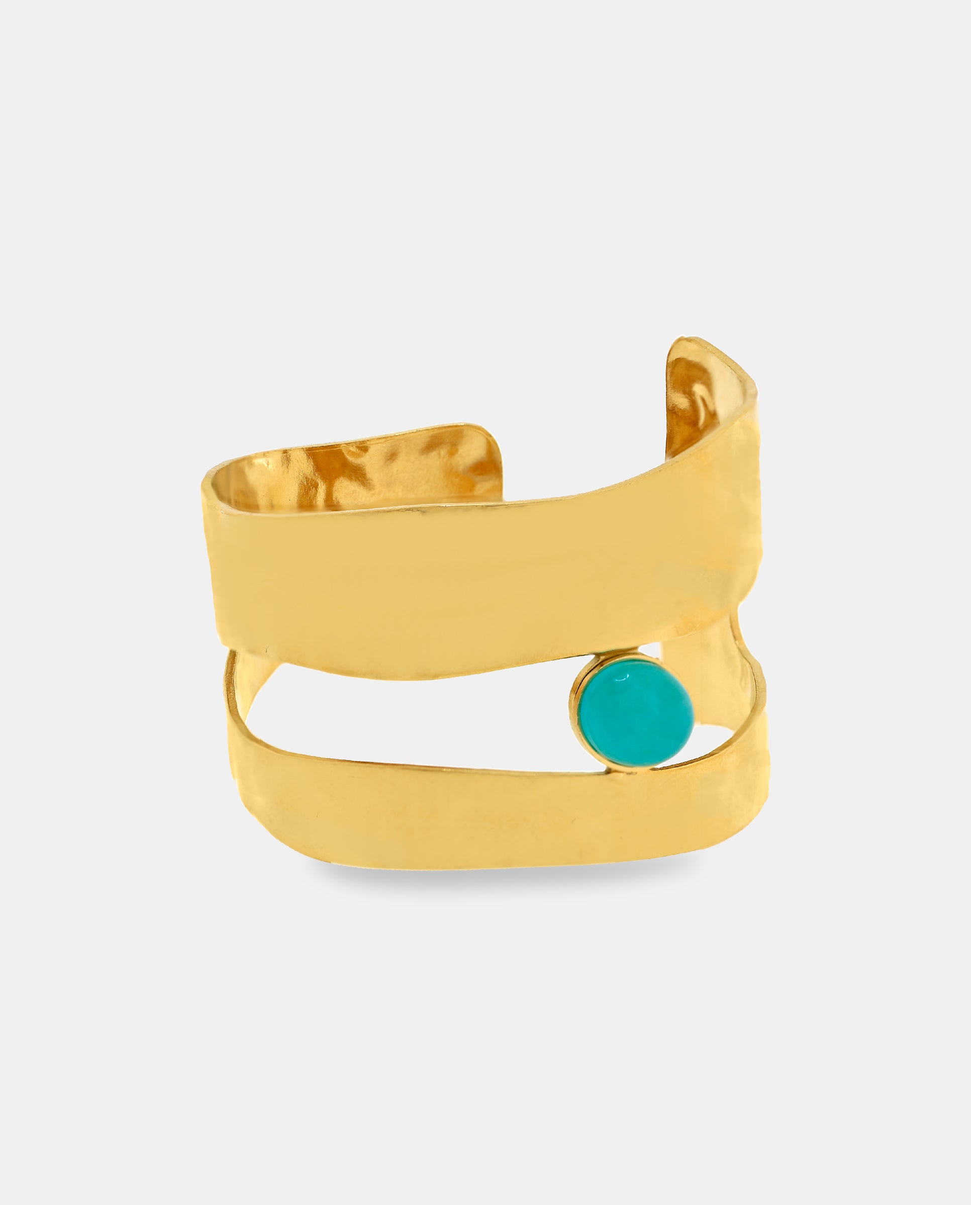 Imagen 0 de Brazalete ancho dorado con lineas abiertas y piedra Dorado