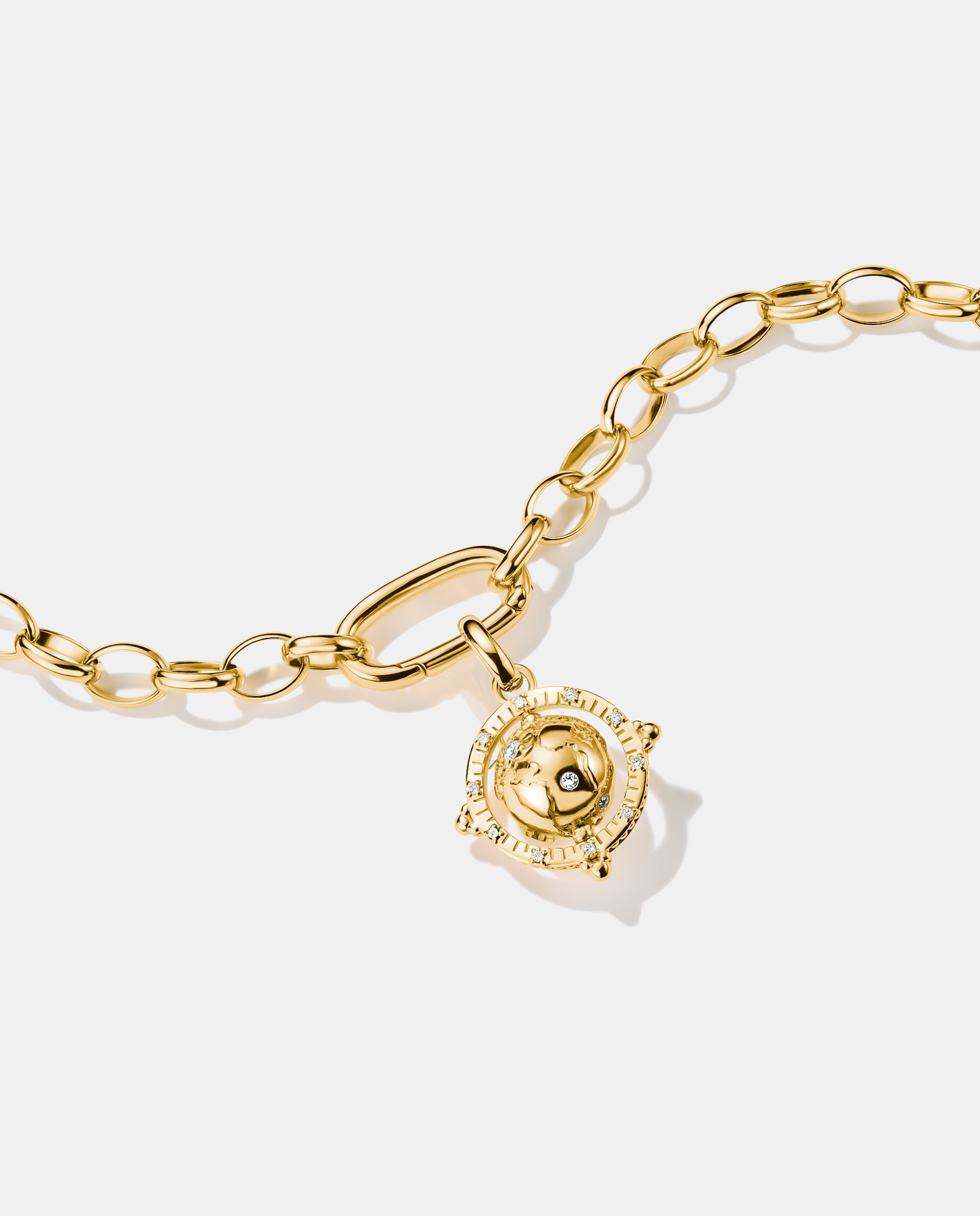 Imagen 2 de Charm globo terráqueo con circonita blanca - Thomas Sabo - Dorado Dorado