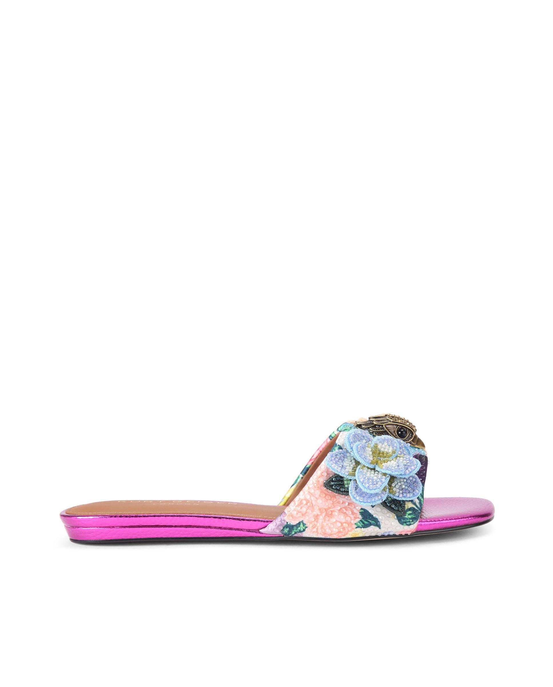 Kurt Geiger - Sandalias planas de mujer con flores bordadas y adorno de águila.