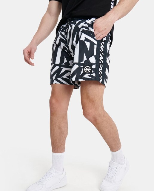 Imagen 0 de Bañador tipo bermuda de hombre con estampado blanco y negro