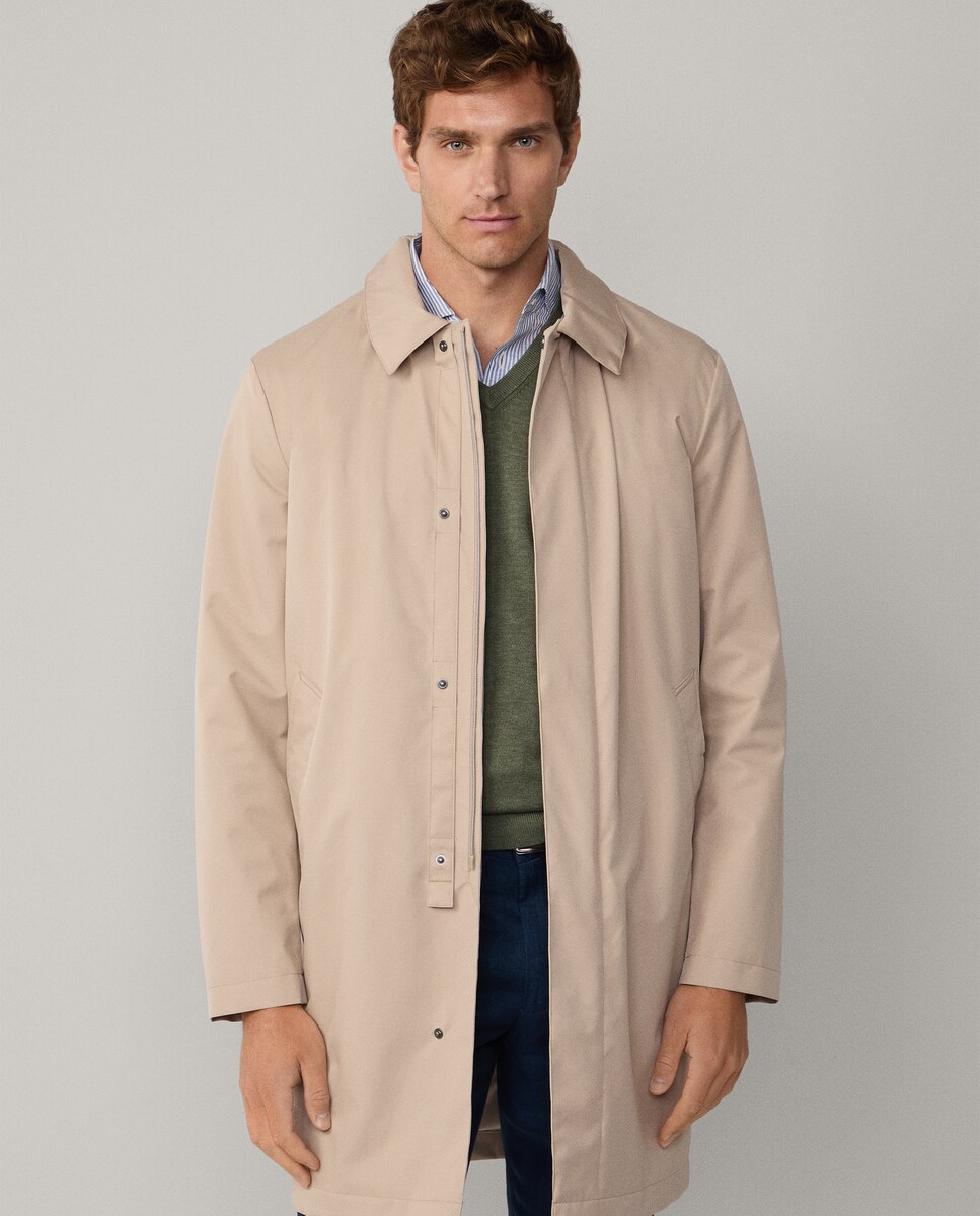Gabardina de hombre resistente al agua con tapeta oculta