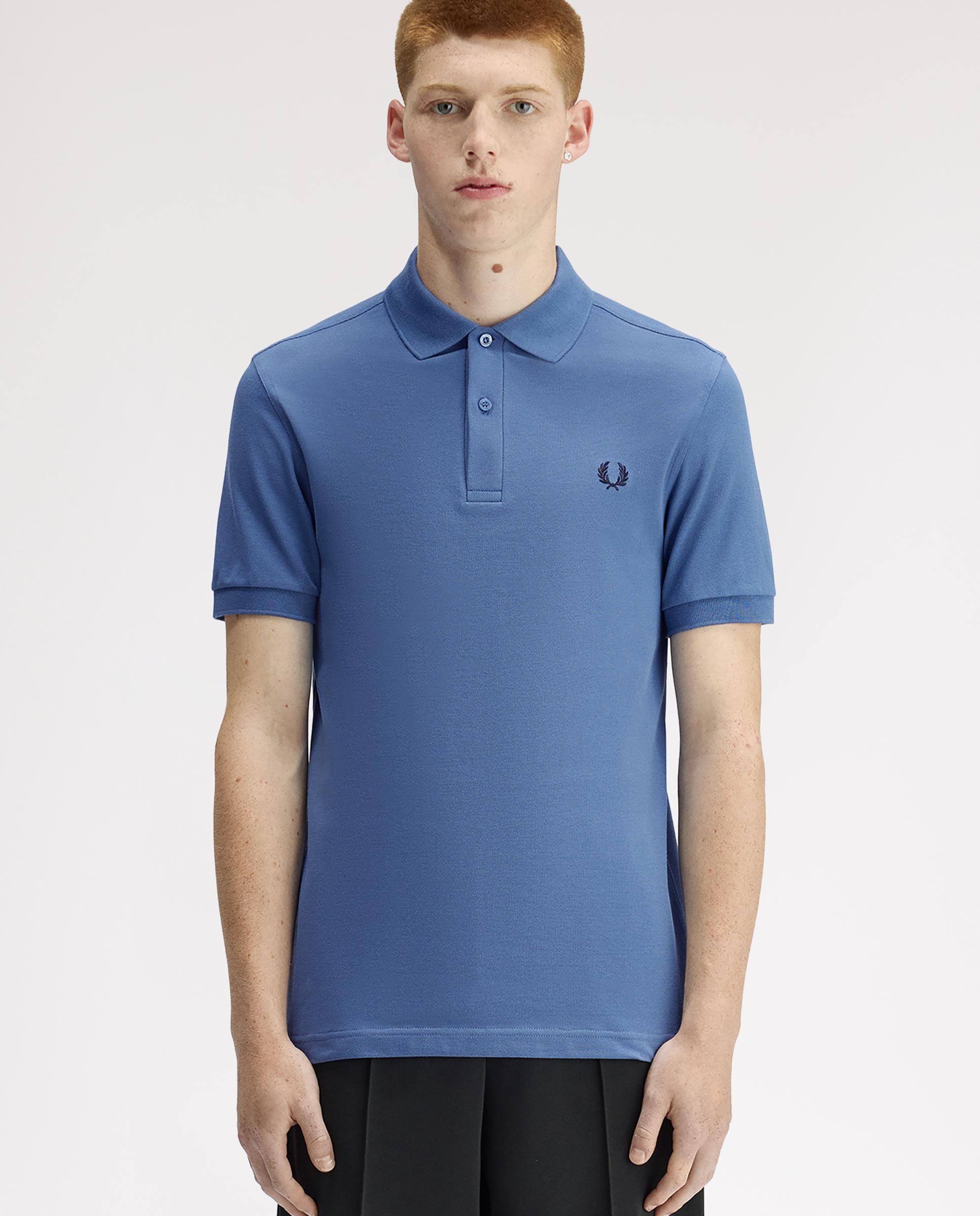 Imagen 0 de Polo de hombre liso de manga corta en piqué de algodón Azul celeste