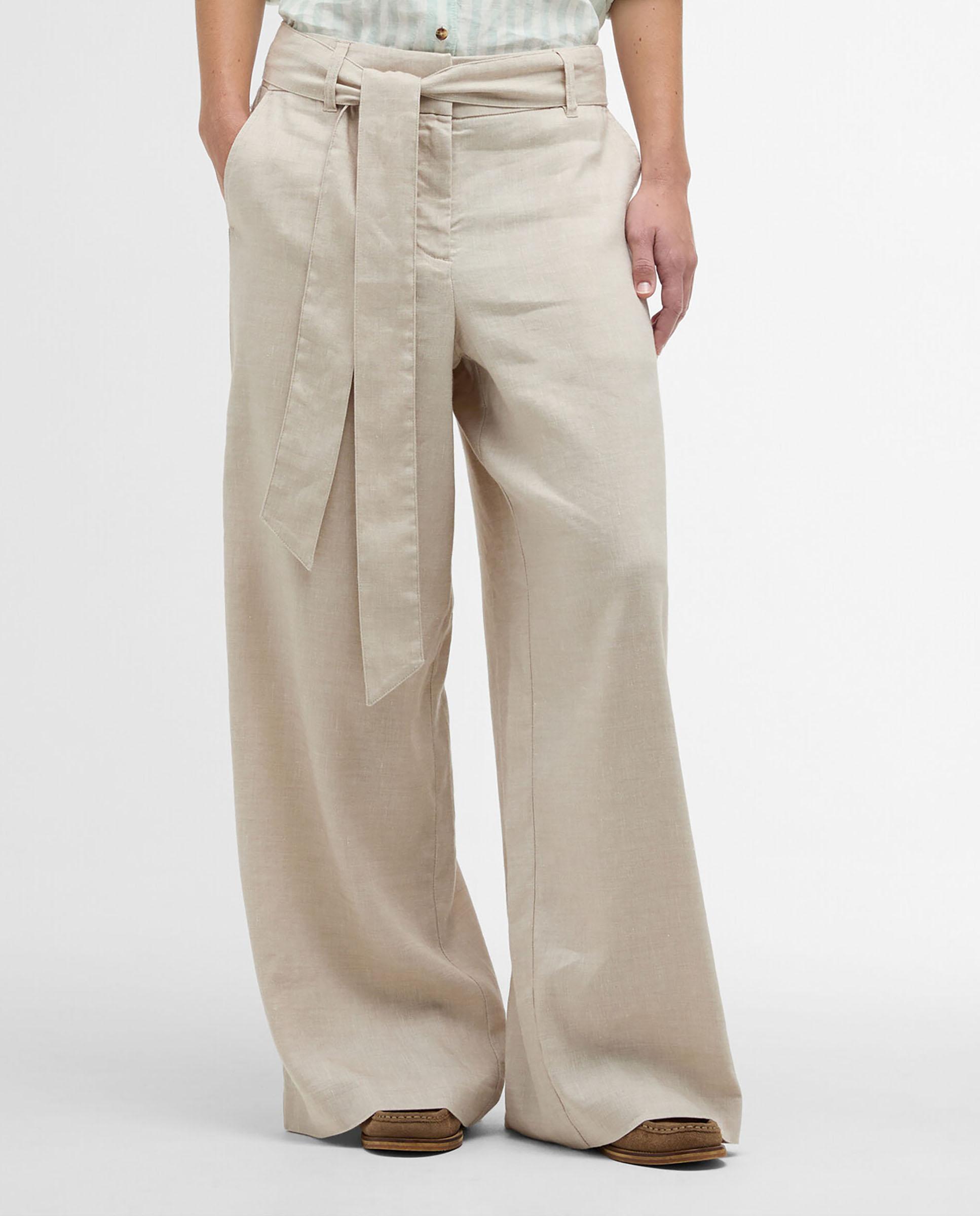 Imagen 0 de Pantalones anchos de mujer con cinturón del mismo tejido para ceñir la cintura y bolsillos laterales Beige