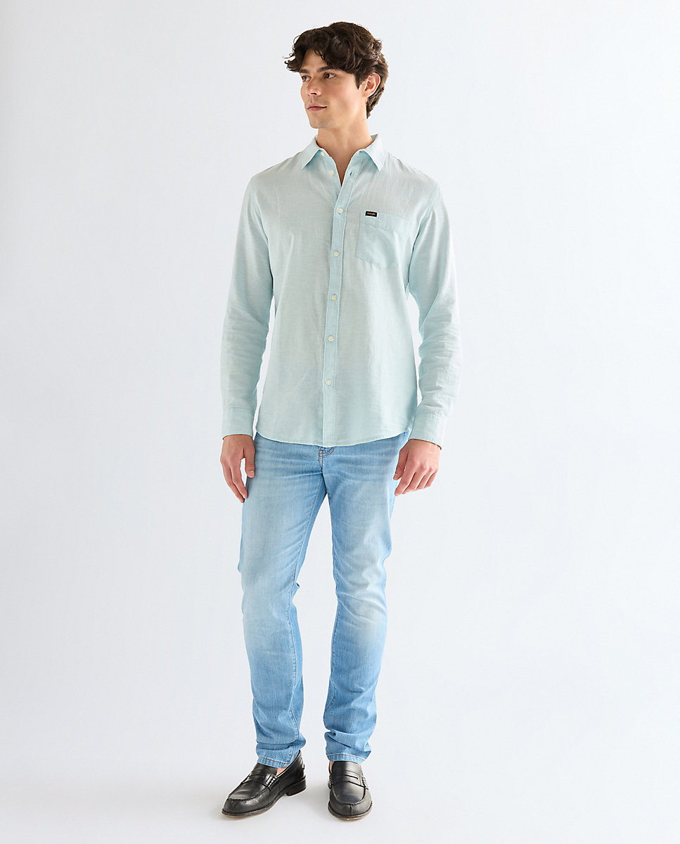 Wrangler - Vaqueros larston de hombre con corte ajustado en el muslo y tiro medio.