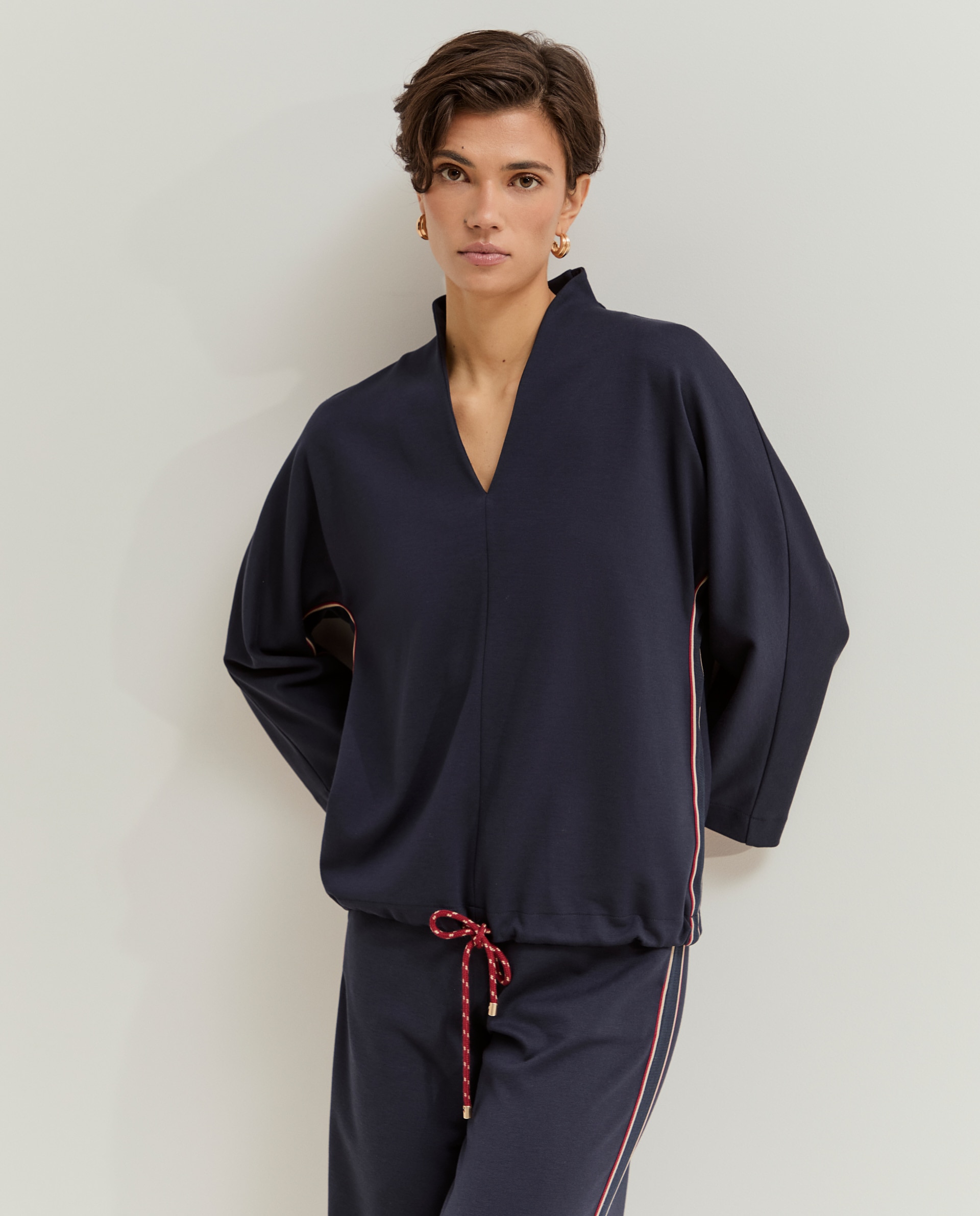 Lion of Porches - Jersey de mujer con bajo ajustable.