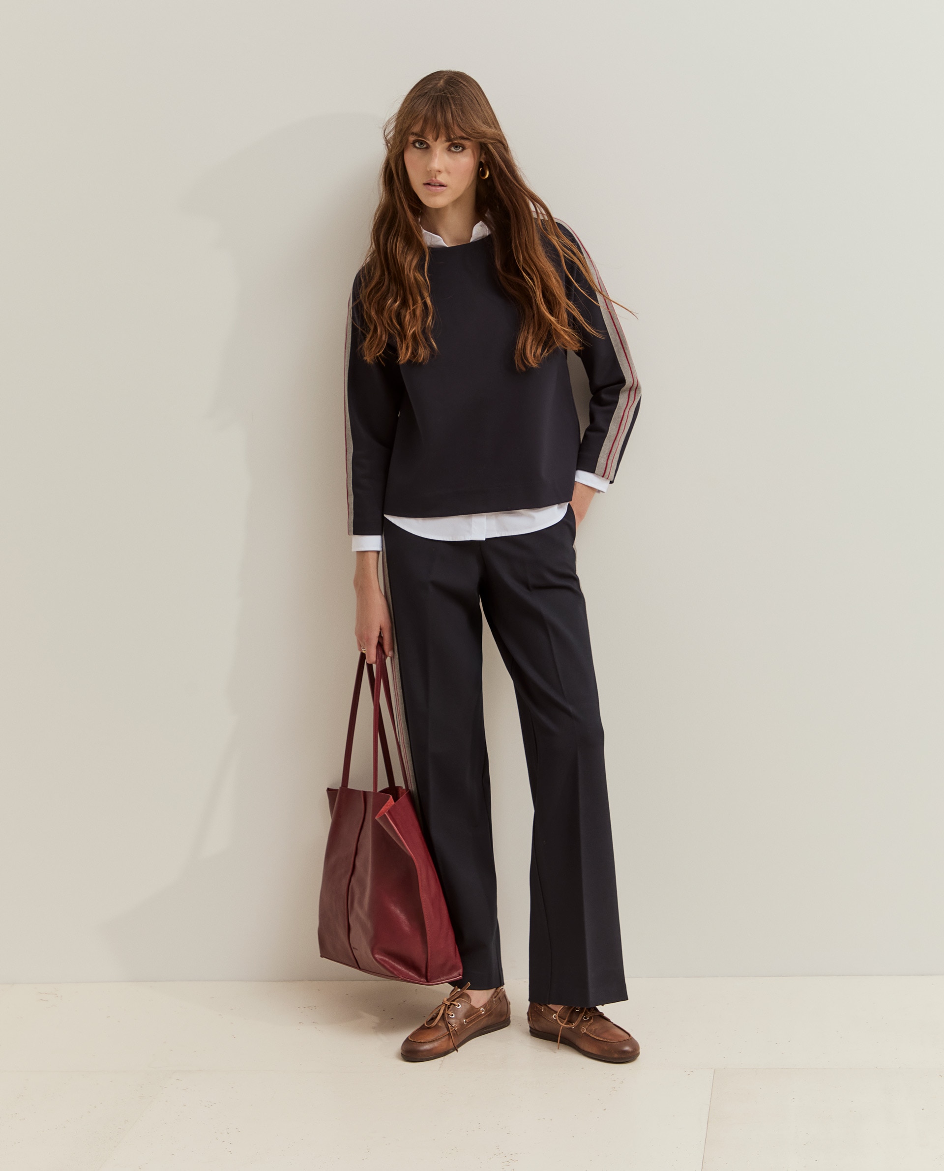 Imagen 0 de Pantalones de mujer de punto con rayas laterales Azul marino