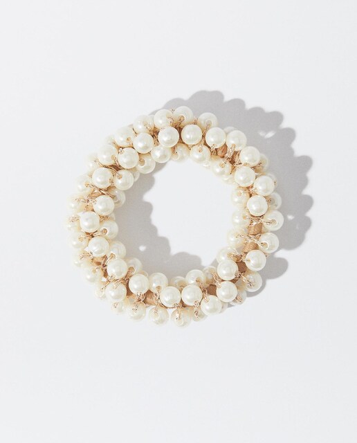 Imagen 0 de Goma para el pelo con perlas decorativas en blanco