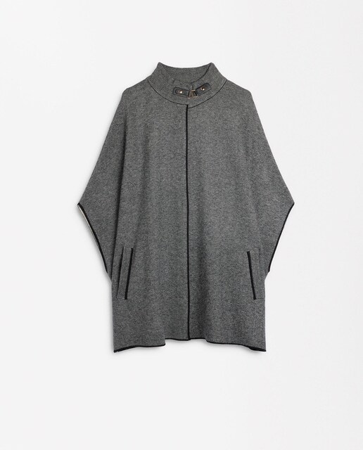Imagen 0 de Poncho de mujer de punto con cuello alto en liso