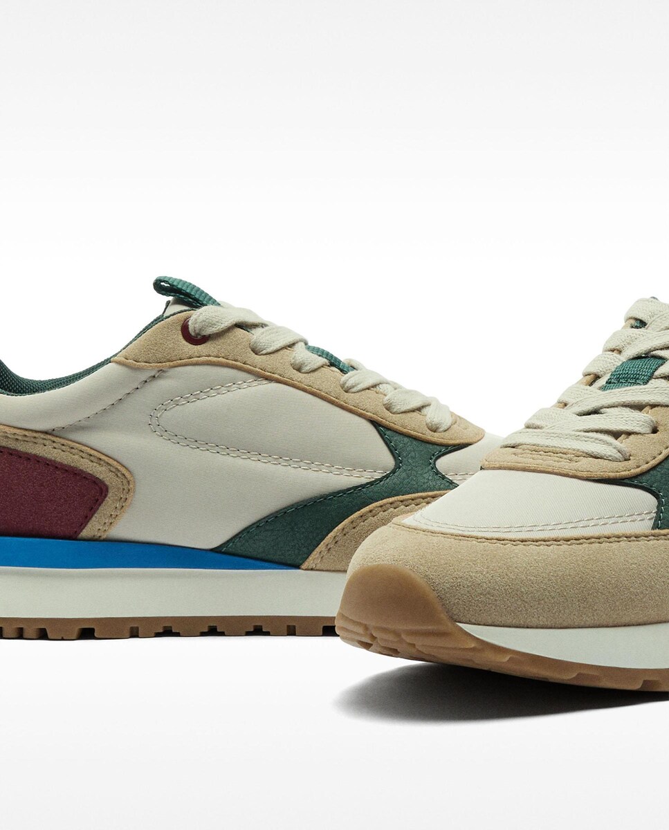 Zapatillas deportivas de mujer con pespuntes en varios colores