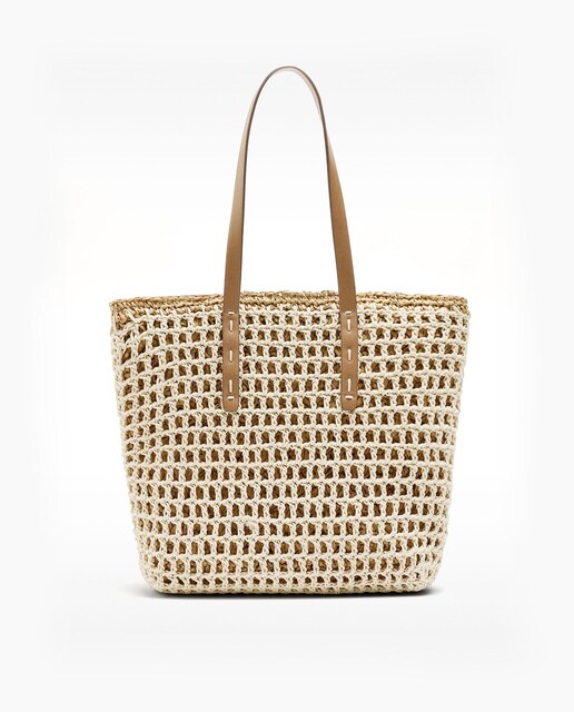 Imagen 0 de Bolso de hombro estilo shopper efecto rafia trenzado con cierre de cremallera en liso