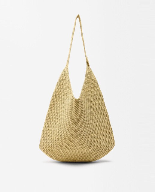 Imagen 0 de Bolso de hombro efecto rafia con detalle lateral